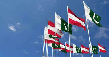 Pakistan and Austria Flags Waving Together in the Sky, Seamless Loop in Wind, Space on Left Side for Design or Information, 3D Rendering video