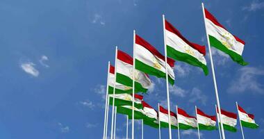 Tajikistan Flags Waving in the Sky, Seamless Loop in Wind, Space on Left Side for Design or Information, 3D Rendering video