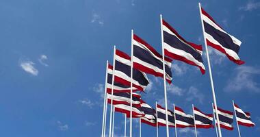 Thailand Flags Waving in the Sky, Seamless Loop in Wind, Space on Left Side for Design or Information, 3D Rendering video