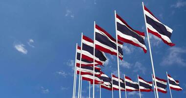 Thailand Flags Waving in the Sky, Seamless Loop in Wind, Space on Left Side for Design or Information, 3D Rendering video