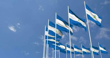 Nicaragua Flags Waving in the Sky, Seamless Loop in Wind, Space on Left Side for Design or Information, 3D Rendering video