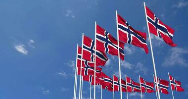 Norway Flags Waving in the Sky, Seamless Loop in Wind, Space on Left Side for Design or Information, 3D Rendering video