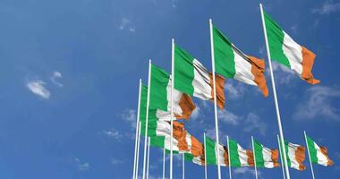 Ireland Flags Waving in the Sky, Seamless Loop in Wind, Space on Left Side for Design or Information, 3D Rendering video