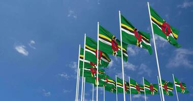 Dominica Flags Waving in the Sky, Seamless Loop in Wind, Space on Left Side for Design or Information, 3D Rendering video