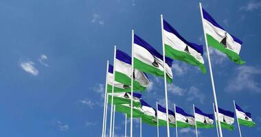 Lesotho Flags Waving in the Sky, Seamless Loop in Wind, Space on Left Side for Design or Information, 3D Rendering video