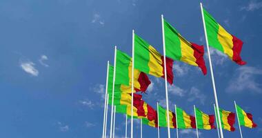 Mali Flags Waving in the Sky, Seamless Loop in Wind, Space on Left Side for Design or Information, 3D Rendering video