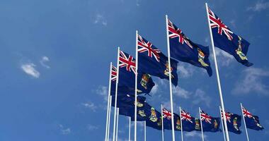 Cayman Islands Flags Waving in the Sky, Seamless Loop in Wind, Space on Left Side for Design or Information, 3D Rendering video