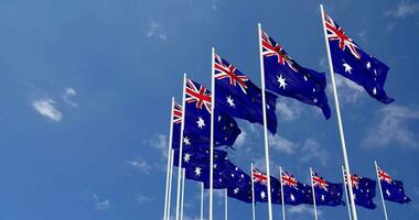 Australia Flags Waving in the Sky, Seamless Loop in Wind, Space on Left Side for Design or Information, 3D Rendering video