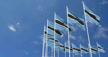 Botswana Flags Waving in the Sky, Seamless Loop in Wind, Space on Left Side for Design or Information, 3D Rendering video