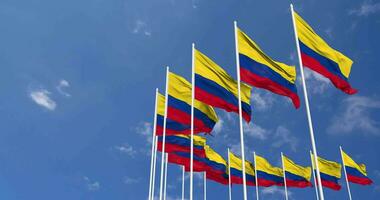 Colombia Flags Waving in the Sky, Seamless Loop in Wind, Space on Left Side for Design or Information, 3D Rendering video