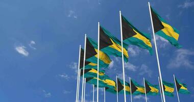 Bahamas Flags Waving in the Sky, Seamless Loop in Wind, Space on Left Side for Design or Information, 3D Rendering video