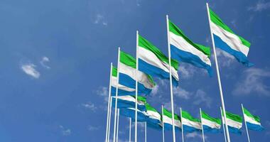 Sierra Leone Flags Waving in the Sky, Seamless Loop in Wind, Space on Left Side for Design or Information, 3D Rendering video