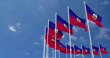 Haiti Flags Waving in the Sky, Seamless Loop in Wind, Space on Left Side for Design or Information, 3D Rendering video