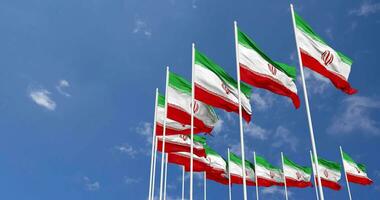 Iran Flags Waving in the Sky, Seamless Loop in Wind, Space on Left Side for Design or Information, 3D Rendering video