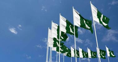 Pakistan Flags Waving in the Sky, Seamless Loop in Wind, Space on Left Side for Design or Information, 3D Rendering video