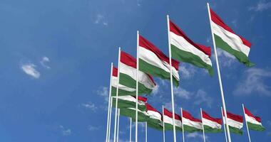 Hungary Flags Waving in the Sky, Seamless Loop in Wind, Space on Left Side for Design or Information, 3D Rendering video