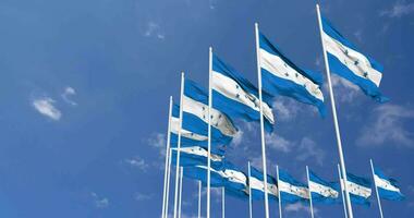 Honduras Flags Waving in the Sky, Seamless Loop in Wind, Space on Left Side for Design or Information, 3D Rendering video