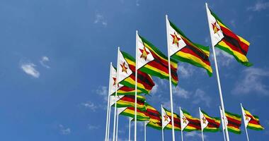 Zimbabue banderas ondulación en el cielo, sin costura lazo en viento, espacio en izquierda lado para diseño o información, 3d representación video