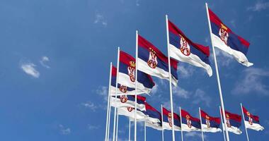 Serbia Flags Waving in the Sky, Seamless Loop in Wind, Space on Left Side for Design or Information, 3D Rendering video