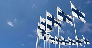 Finland Flags Waving in the Sky, Seamless Loop in Wind, Space on Left Side for Design or Information, 3D Rendering video