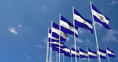 El Salvador Flags Waving in the Sky, Seamless Loop in Wind, Space on Left Side for Design or Information, 3D Rendering video