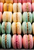 AI generated display case filled with colorful macarons, arranged in rows and hues of pastel pink, blue, green photo