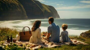 ai generado un familia teniendo un picnic en un aislado playa, con un fondo de imponente acantilados y estrellarse olas foto