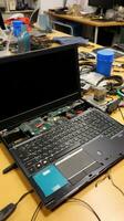 AI generated online tutorials or consulting forums dedicated to laptop repairs photo