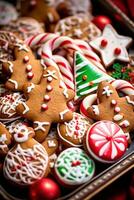 AI generated tray filled with freshly baked cookies in shape of Christmas trees, gingerbread men, and candy canes photo