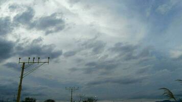 Airplane passing and landing a cloudy evening video