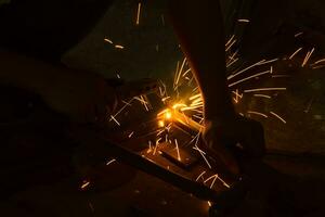 welding steel with sparks lighting photo