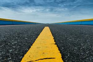 Empty road and the traffic lines. photo