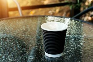 Morning coffee in paper glass. photo