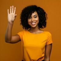 AI generated Photo of a dark skinned smiling woman waving on an orange background. High quality . AI Generative