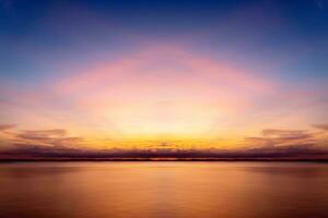 The sky and the lake in the twilight after sunset. photo