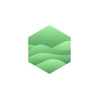 a green hexagon with mountains in the background vector