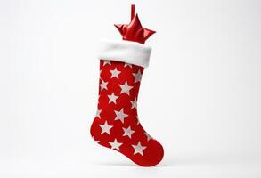 AI generated a red and white christmas stocking laying on top of a white background. photo