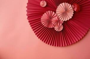 AI generated a red fan is hung from a pink wall photo