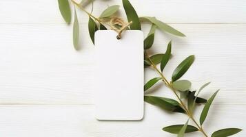 AI generated white blank tag with blank front realistic on a mockup template in a white wooden table with olive leaf branch photo