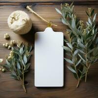 AI generated white blank tag with blank front realistic on a mockup template in a white wooden table with olive leaf branch photo