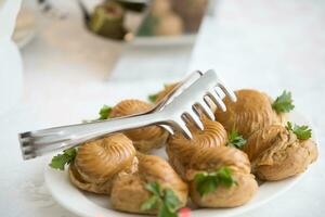 Buffet Dish. Choux pastry on the table photo