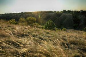 Sunny autumn day in the park nearly the river in Dnipro city photo