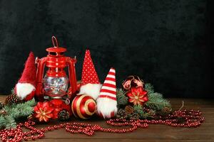 Grey background with christmas decorations, dolls and copy space photo