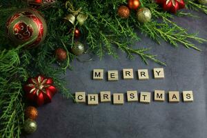 Grey background with christmas decorations and text photo