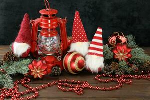 Grey background with christmas decorations, dolls and copy space photo