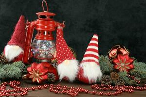 Grey background with christmas decorations, dolls and copy space photo