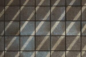 antecedentes de ladrillo pared textura con sombra y luz de sol. arquitectónico antecedentes. foto