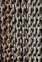 a close up of a chain link fence photo