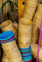 baskets are stacked together in a room photo