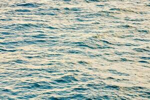 the ocean is seen from above with waves photo